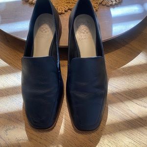 Black Vince Camuto flats.